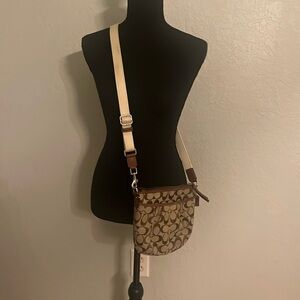 Coach crossbody, brown signature print, brown leather trim, cream strap